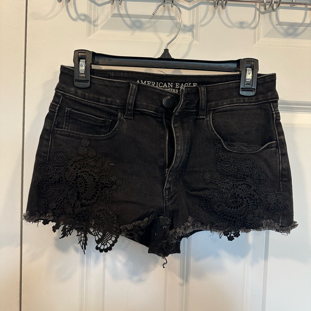 Distressed black shorts with lace detail from American Eagle